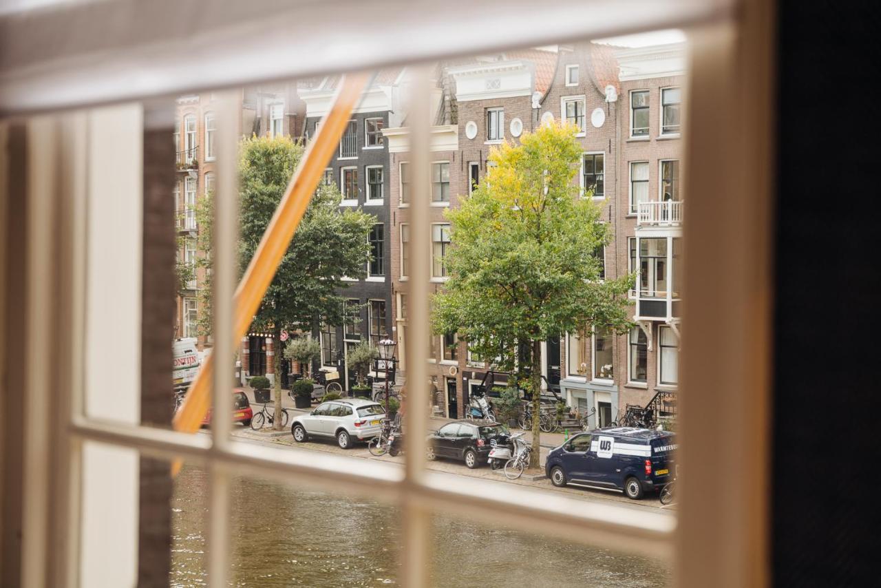 Hotel 717 アムステルダム エクステリア 写真 View from the window of a canal house in Amsterdam