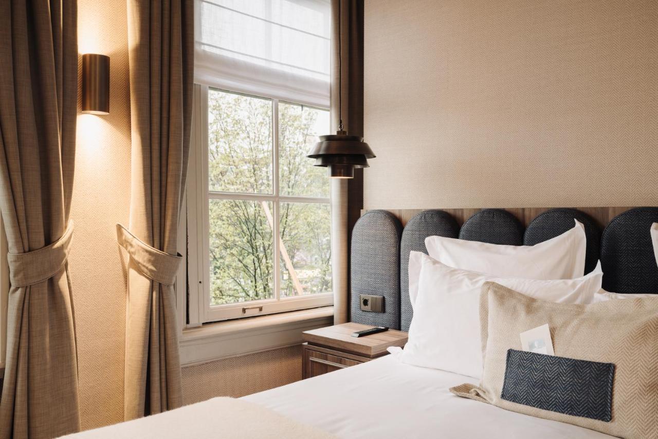 Hotel 717 アムステルダム エクステリア 写真 A bedroom at the hotel