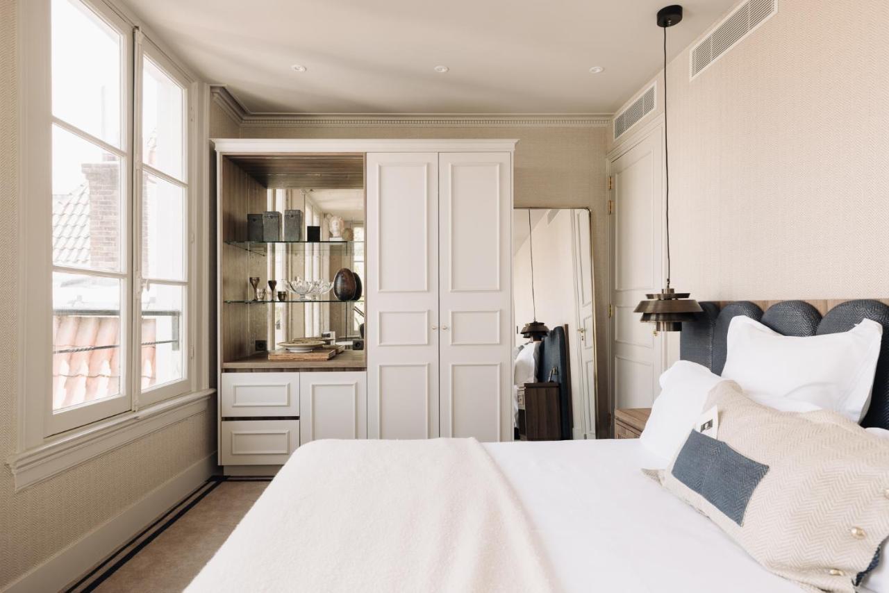 Hotel 717 アムステルダム エクステリア 写真 A bedroom at the Hotel de la Paix